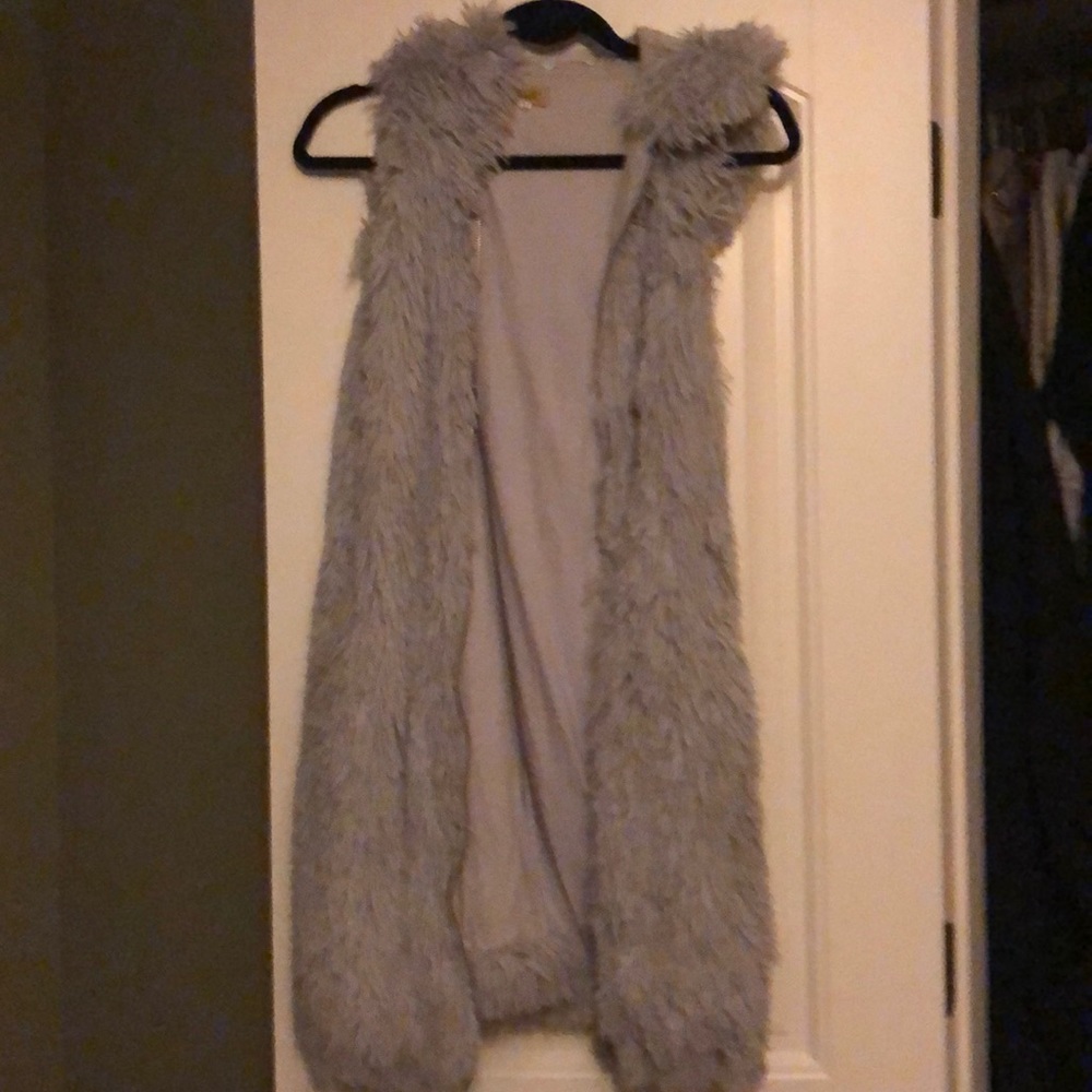 Long furry, hooded vest